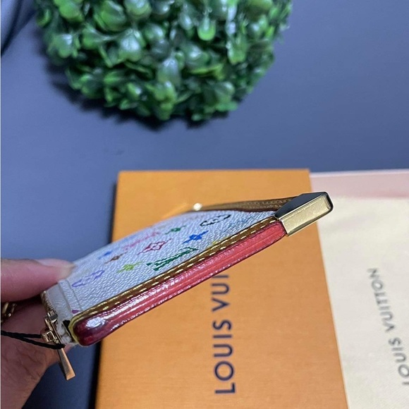 For Sale this Authentic Louis Vuitton Muliticolore keypouch in Blanc! - Picture 7 of 7